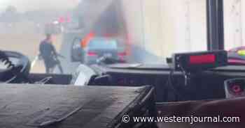 Video: Driver's Shoes Melt to the Floor in Car Inferno, Heroic Rookie Cop Drags Him From Burning Vehicle
