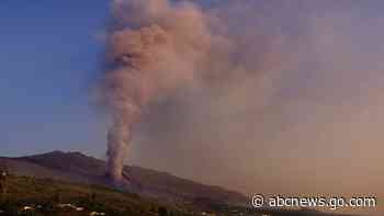Lava from Spanish volcano surges after crater collapse
