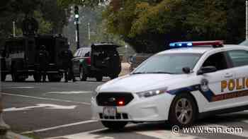 Capitol Police take a suspect into custody from a 'suspicious vehicle' in front of the Supreme Court