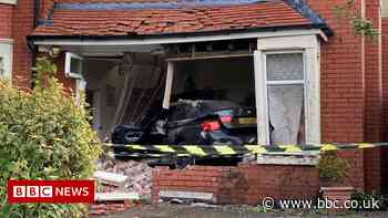 Poulton car crash: BMW crashes into house and stops in lounge