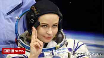 Russian film team boldly shoot towards space station