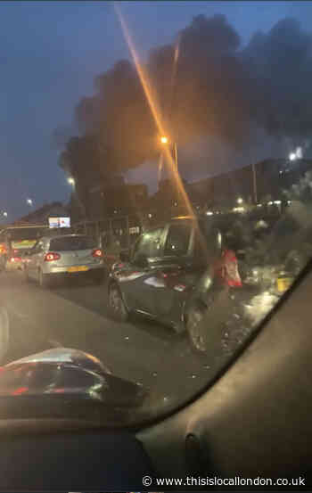 Road shut as firefighters tackle large fire in West Hendon