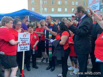 Mercy Hospital CWA workers hold candlelight vigil on seventh day of strike