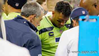 Wilson hurts finger, exits early in Seahawks' loss