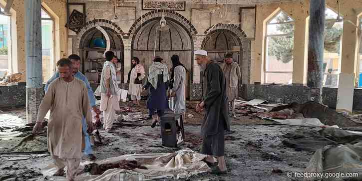 A bomb detonated at a packed mosque in northern Afghanistan and killed or wounded at least 100 people