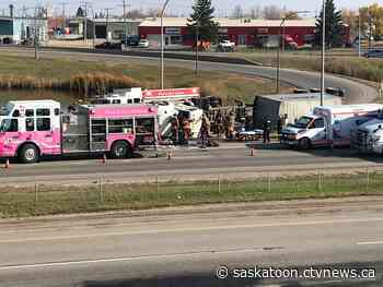 Semi overturns, trapping driver inside in Saskatoon