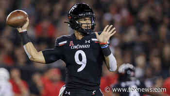 Ridder, Ford help No. 5 Cincinnati rout Temple 52-3