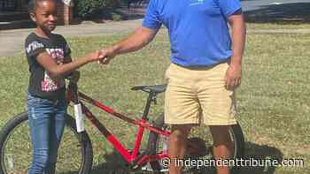 'This is the girl': Forest Hill UMC presents raffle winner with new bike - Independent Tribune