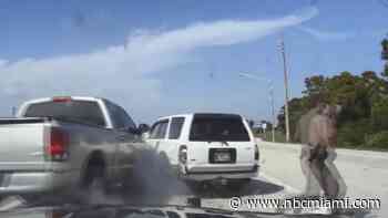 Video Shows Florida Trooper, Woman Narrowly Avoid Truck on Side of I-95