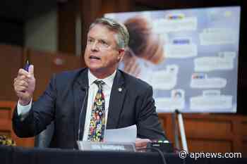 GOP doc dispenses sketchy medical advice on virus immunity - Associated Press