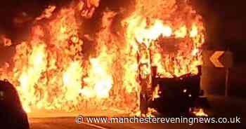 Firefighters tackle large blaze in Oldham after road sweeper catches fire