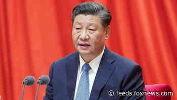 Chinese president insists on Taiwan 'reunification,' avoids threat of force