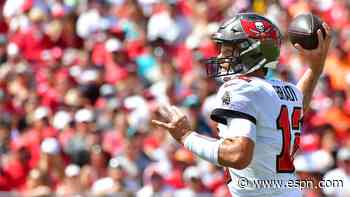 Brady throws for 5 TDs in win despite hurt thumb