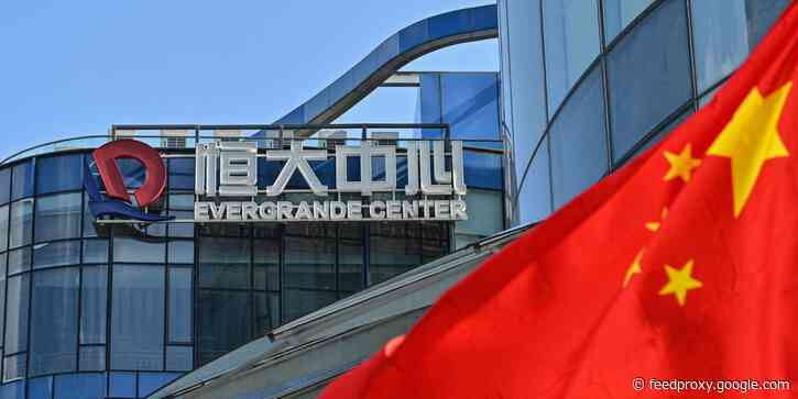 Evergrande punishes 6 execs who cashed out early on the company's investment products while it faces a $300 billion debt