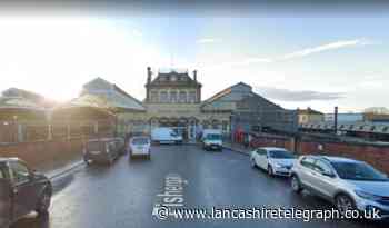 Man arrested after person threatened with meat cleaver close to train station