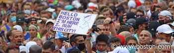 Photos: Signs and other fun sights on this unusual Marathon Monday - Boston.com