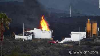 Lava from La Palma volcano sparks factory fire, pushing 2,500 people into lockdown