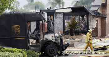 At least 2 dead in California plane crash that torched homes