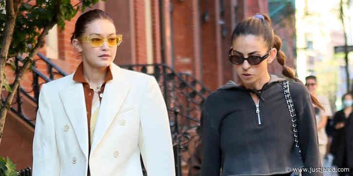 Gigi Hadid Looks So Stylish In A Long, White Coat While Out With A Friend in NYC
