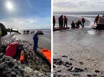Rescue operation launched after two people get stuck in sand and mud