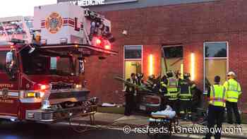 Driver critically injured after vehicle crashes into medical building in Suffolk