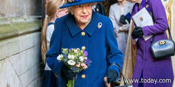 Queen Elizabeth II uses cane to walk into Westminster Abbey