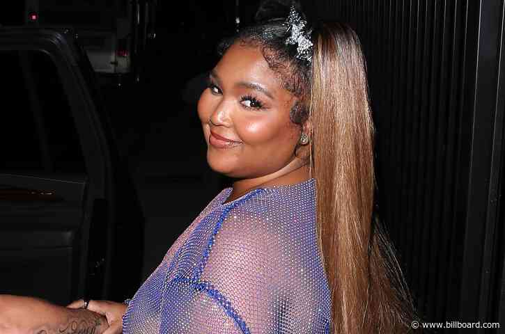 Lizzo Sparkles In Sheer Dress at Cardi B’s Dancehall-Themed Birthday Party