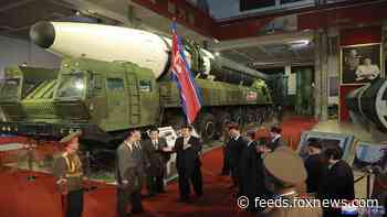 Kim vows ‘invincible’ North Korea military during rare exhibition of weapons