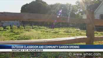 Community organizations cut the ribbon on Greentopia community garden and classroom