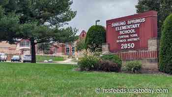Elementary teacher threatened to shoot people over removal of COVID-19 barrier, police say