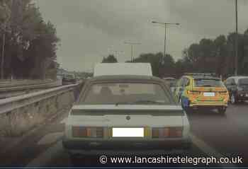 Driver says he was 'ignored' by police whilst stuck between live lanes on motorway