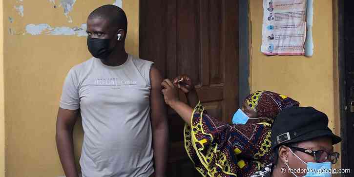 Here's what it was like to get one Covid shot in Nigeria, where less than 3% are vaccinated, and a second in the UK, where people are already getting access to booster shots