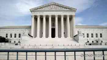 Two conservatives resign from Biden's Supreme Court commission