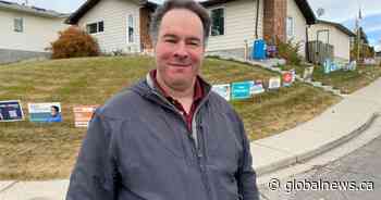 Calgarian promotes civic election engagement with display of 50 campaign signs