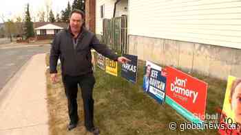 Calgarian promotes civic election with display of 50 campaign signs