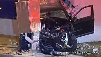 Police say vehicle crashed between pole, building on Granby Street in Norfolk