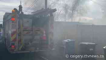 Fire damages power lines, home, garage in southwest Calgary - CTV News Calgary