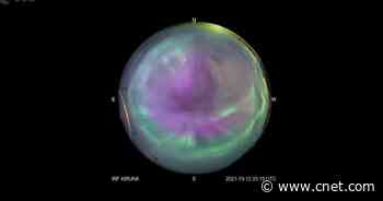 All-sky camera captures swirling majesty of a purple aurora over Earth     - CNET