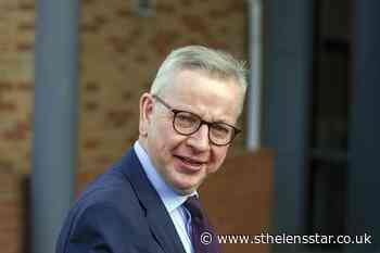 Michael Gove escorted by police after being approached by demonstrators - St Helens Star