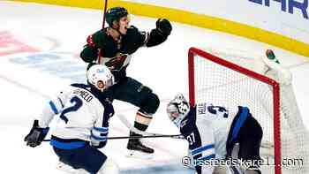 Wild scratch back, top Jets 6-5 in OT