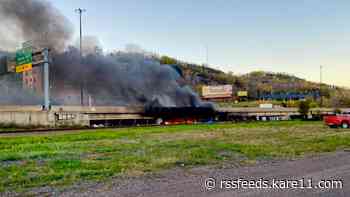Construction crew helps put down Duluth homeless encampment fire