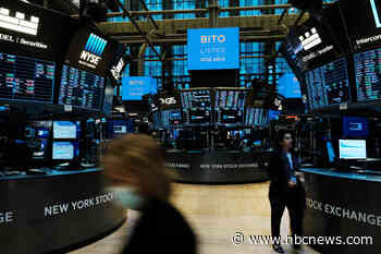 Bitcoin hits new record high, topping $65,000