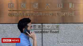 Evergrande shares fall 14% as trading resumes in Hong Kong