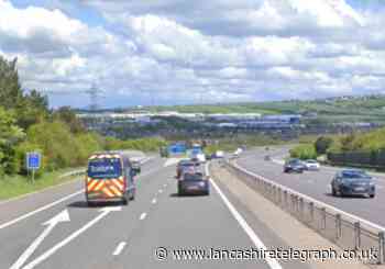 Two lorry crash closes part of M65 near Blackburn