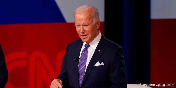 Biden pushes back against Joe Manchin, saying he doesn't think people need to work to get the expanded child tax credit
