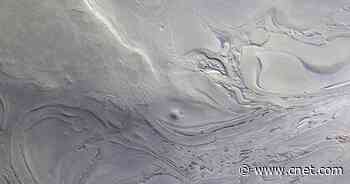 Spacecraft spots mesmerizing swirls at one of the lowest points on Mars     - CNET