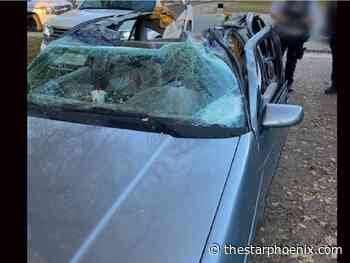 Woman charged after driving away from crash with roof ripped off