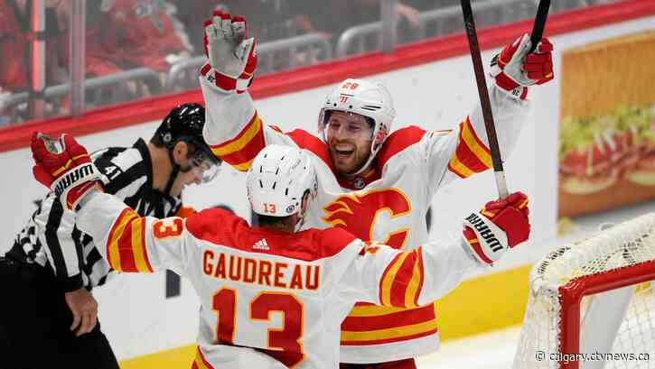 Lindholm's 2nd hat trick lifts Flames past Caps 4-3 in OT