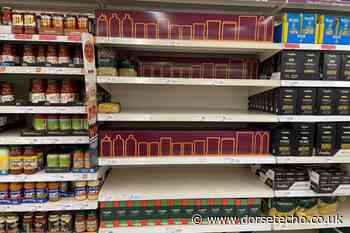 Dorset branch of Sainsbury's uses cardboard images to hide empty shelves amid food shortage - Dorset Echo
