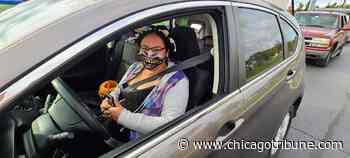 Drive-thru event in Aurora offers early taste of Halloween - Chicago Tribune
